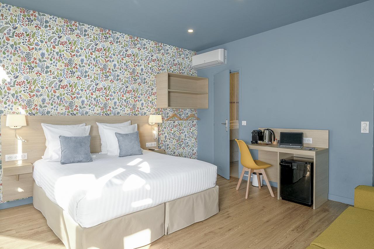 Junior Suite mit Balkon und Aussicht auf die Notre Dame